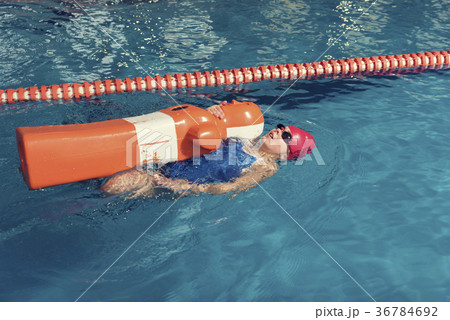One Girl with Training Dummy in a Pool 36784692