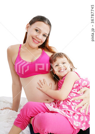 Beautiful pregnant woman with her daughter 36787745