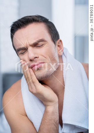 Unhappy tragic man feeling horrible  36789031