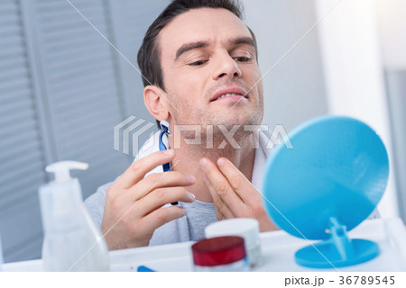 Cute pretty man shaving his bristles 36789545
