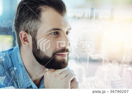 Handsome thoughtful man holding close hands and Handsome thoughtful man holding close hands and 36790207