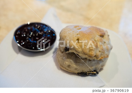 Close up of Scone with Fruit Jam. Close up of Scone with Fruit Jam. 36790619