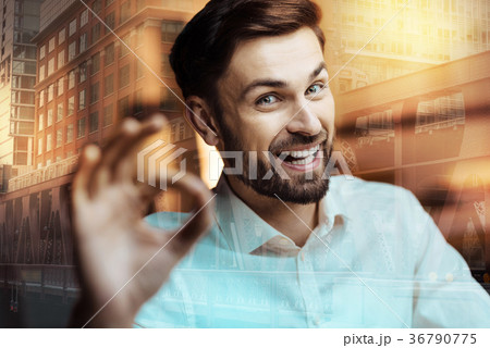 Happy young man showing OK gesture Happy young man showing OK gesture 36790775