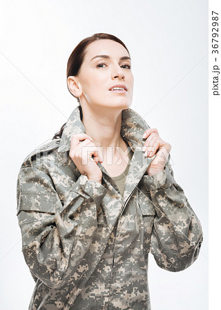 Musing glad woman serving her homeland 36792987