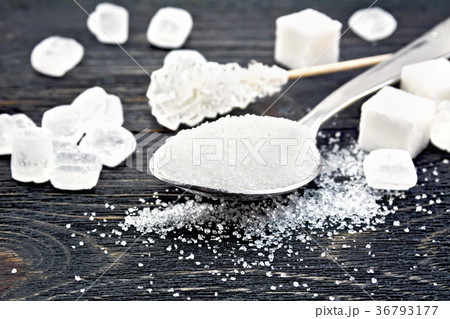 Sugar white in spoon on board 36793177