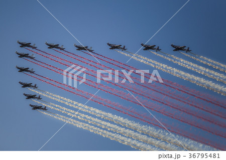 Reactive jet plane flying in formation on blue sky Reactive jet plane flying in formation on blue sky 36795481