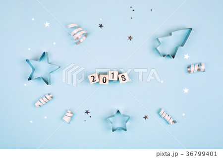Feliz Navidad text on pastel blue background Feliz Navidad text on pastel blue background 36799401