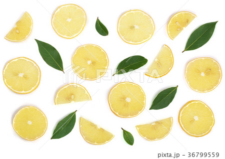Slices lemon with leaves isolated on white 36799559