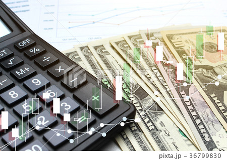 Double exposure of business Calculator and pen Double exposure of business Calculator and pen 36799830
