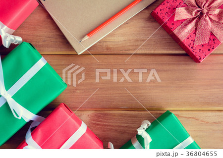 top view christmas gift box on wood table top view christmas gift box on wood table 36804655