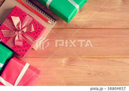 top view christmas gift box on wood table 36804657