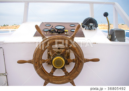 captain's bridge on the yacht. wooden helm of the captain's bridge on the yacht. wooden helm of the 36805492
