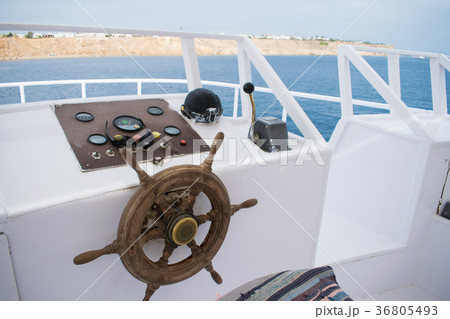 captain's bridge on the yacht. wooden helm captain's bridge on the yacht. wooden helm 36805493