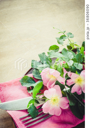 Festive Table setting with pink flowers. 36806090
