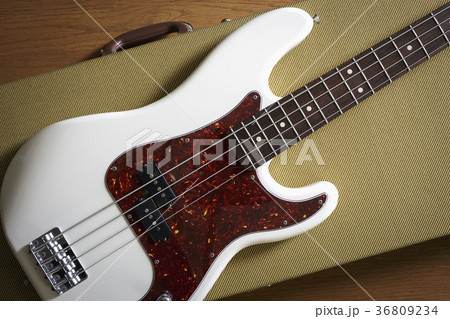 Bass guitar lying on guitar case Bass guitar lying on guitar case 36809234