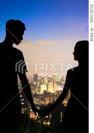 silhouette of couple 36813619