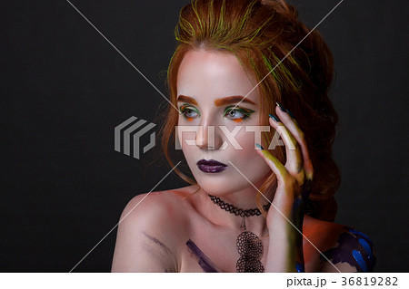 Portrait of a beautiful woman with a creative style Portrait of a beautiful woman with a creative style 36819282