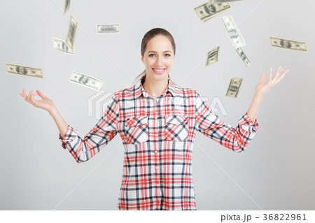 happy woman standing under money rain happy woman standing under money rain 36822961