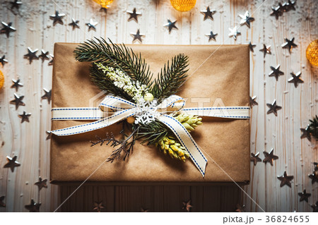 Christmas gift box with a bow and a beautiful  36824655