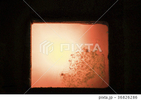 Molten metal in sand mold after pouring; 36826286