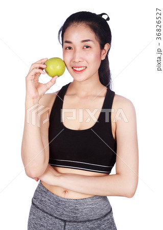 fitness woman with green apple isolated on white background fitness woman with green apple isolated on white background 36826527