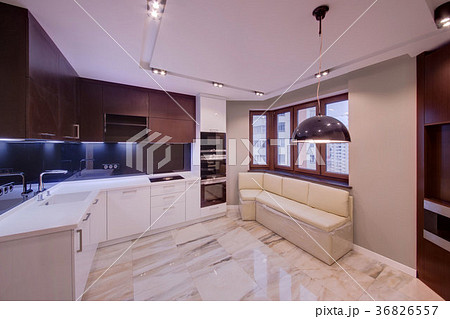 The combined white kitchen with dark inserts and a The combined white kitchen with dark inserts and a 36826557
