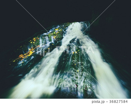 Light painting in night waterfall in autumn stream Light painting in night waterfall in autumn stream 36827584