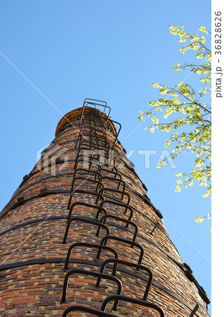 High industrial chimney view from below. High industrial chimney view from below. 36828626