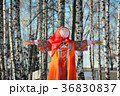 Maslenitsa Scarecrow in winter sunny day 36830837