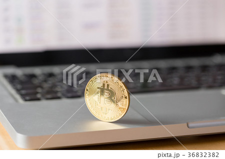 coin bitcoin on the laptop keyboard. the concept 36832382