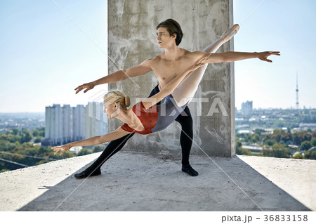 Ballet dancers posing at unfinished building Ballet dancers posing at unfinished building 36833158