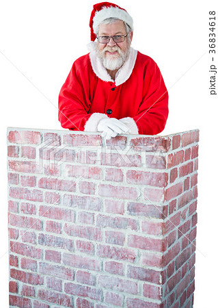 Santa claus leaning on the chimney against white background Santa claus leaning on the chimney against white background 36834618