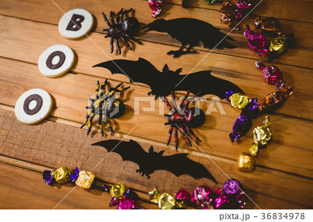 Cookies with boo text by decorations and chocolates table Cookies with boo text by decorations and chocolates table 36834978