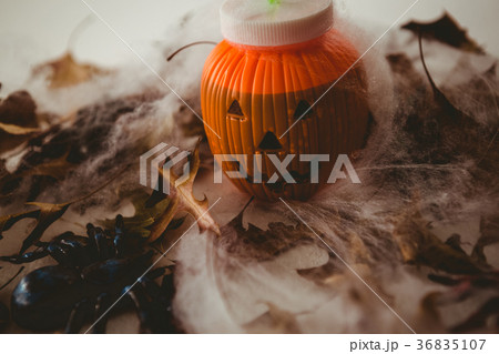 High angle view of drink in jack o lantern container with decorations High angle view of drink in jack o lantern container with decorations 36835107