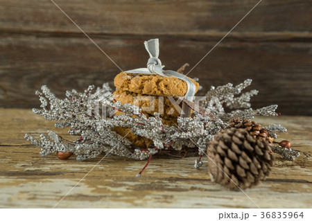 Cookies with christmas decoration arranged on wooden plank Cookies with christmas decoration arranged on wooden plank 36835964