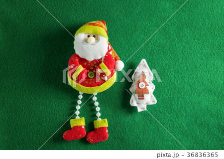 Handmade christmas decorations on green background Handmade christmas decorations on green background 36836365