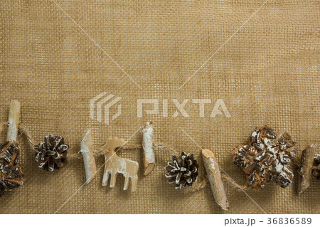 Overhead view of Christmas decoration with stick and dry flower Overhead view of Christmas decoration with stick and dry flower 36836589