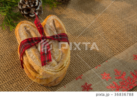 Close up of baked food tied with ribbon Close up of baked food tied with ribbon 36836788