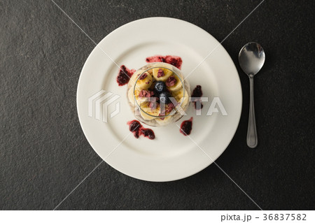 Fruit cereal in jar on concrete background Fruit cereal in jar on concrete background 36837582