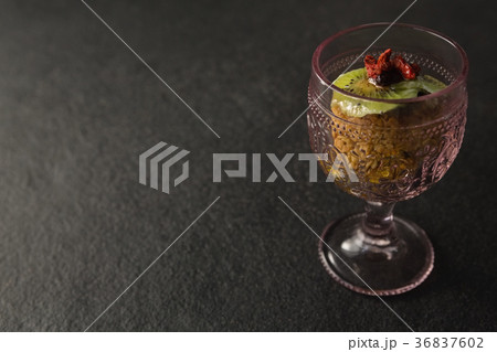 Dried fruits and granola bar in glass 36837602