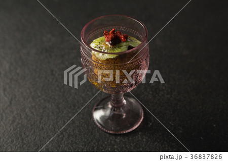 Dried fruits and granola bar in glass Dried fruits and granola bar in glass 36837826