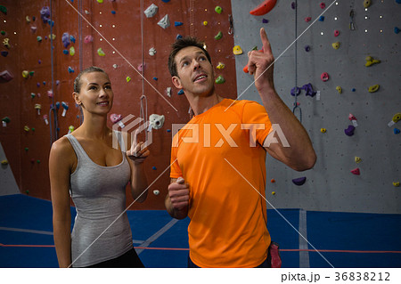 Athletes talking while standing in studio Athletes talking while standing in studio 36838212