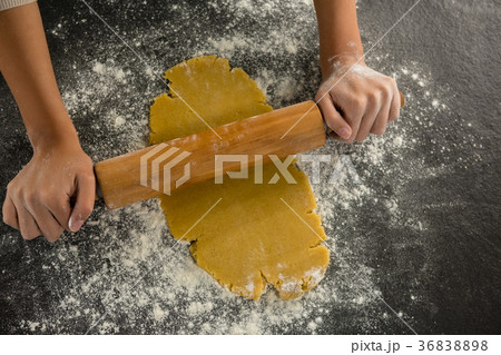 Hand baking dough with rolling pin Hand baking dough with rolling pin 36838898