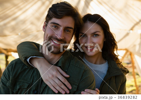 Portrait of smiling couple in tent 36839282