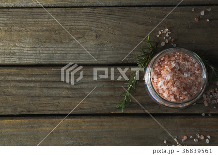 Himalayan salt and rosemary on wooden table 36839561