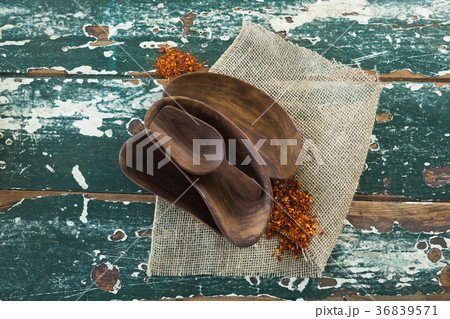 Various wooden scoop on table 36839571