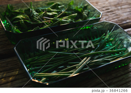 Chives and herbs in a bowl 36841266