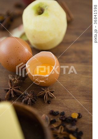 High angle view of broken egg with granny smith apple High angle view of broken egg with granny smith apple 36841598