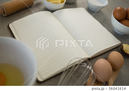 Close up of ingredients amidst open book 36841614