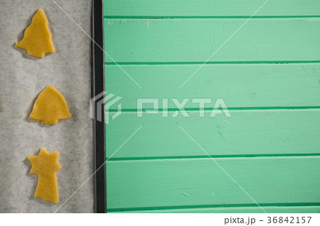 Overhead view of raw cookies in baking tray Overhead view of raw cookies in baking tray 36842157